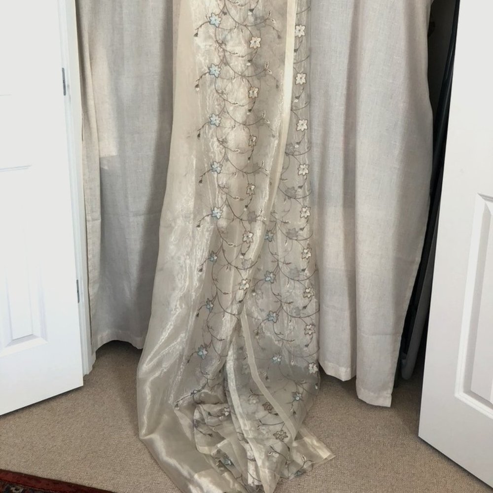 Sheer, flowered ivory curtains